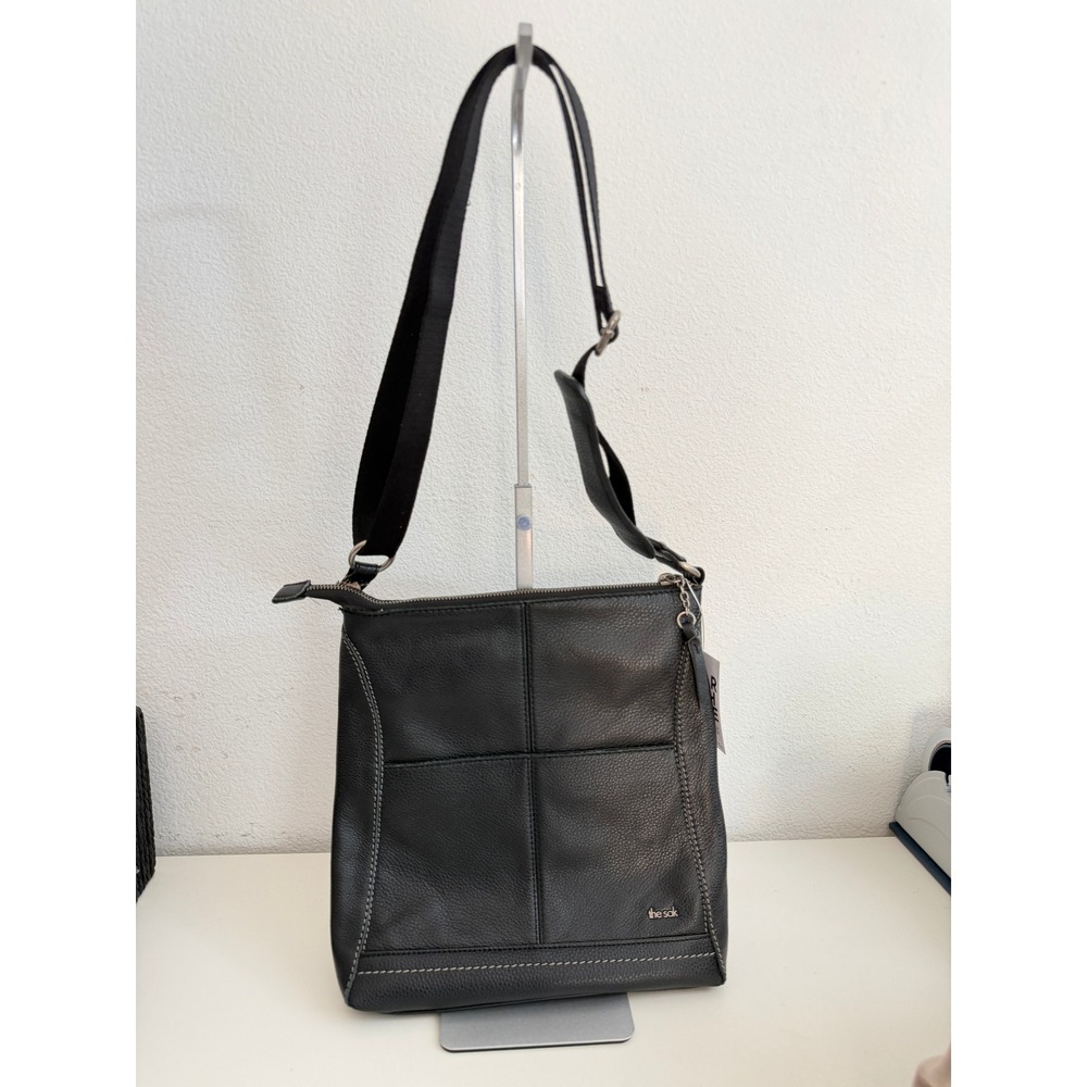 The Sak Black Pebbled Leather Crossbody Bag Adjustable Strap Contrast Stitching